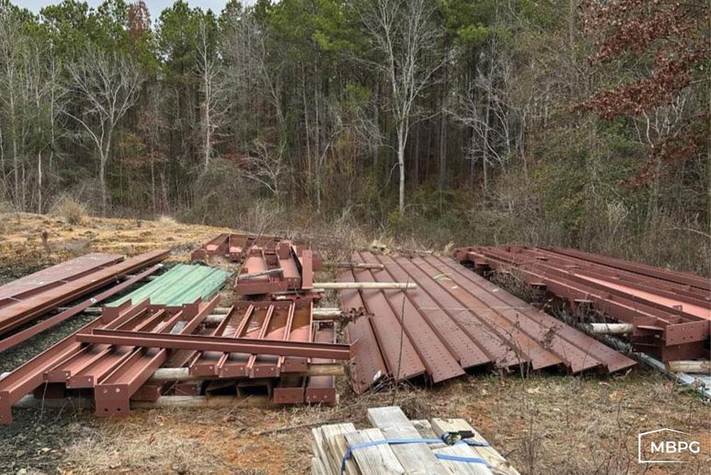 Steel Materials Laying on Grass