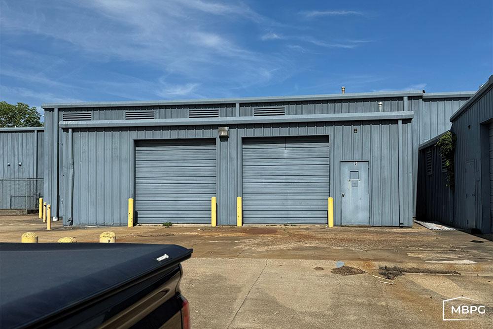 AR1784 | Blue Used Metal Building with Two Roll Up Doors Blue Used Metal Building with Two Roll Up Doors