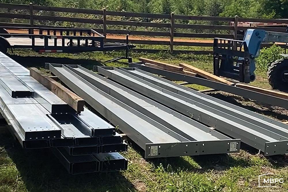 FL1810-1 | Metal Building Beams on Grass Metal Building Beams on Grass