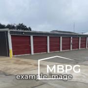 brown with red doors mini storage