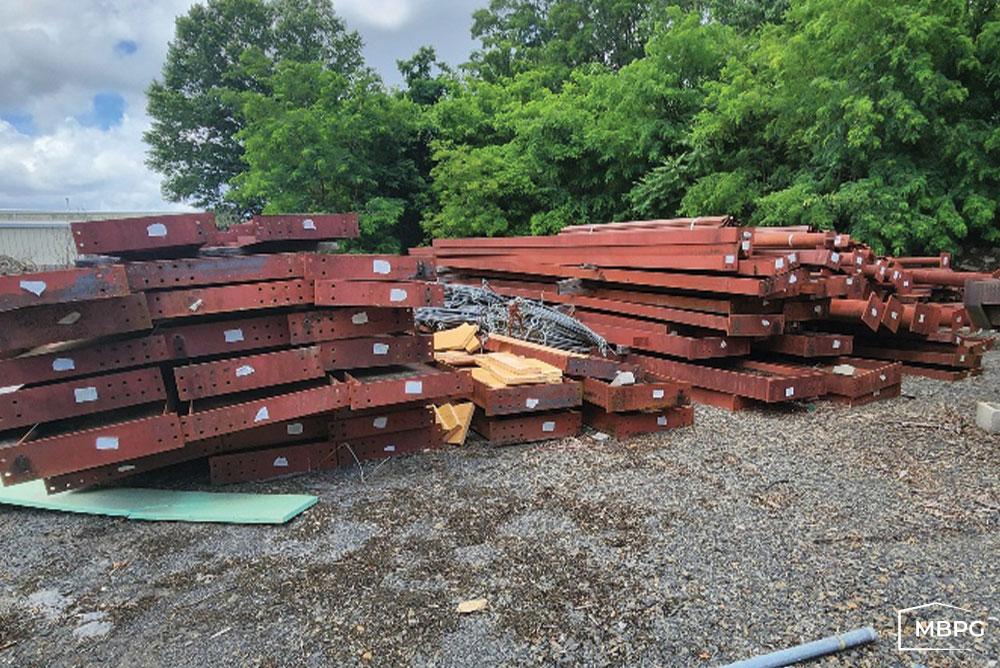 Used Metal Building Materials on Gravel Used Metal Building Materials on Gravel